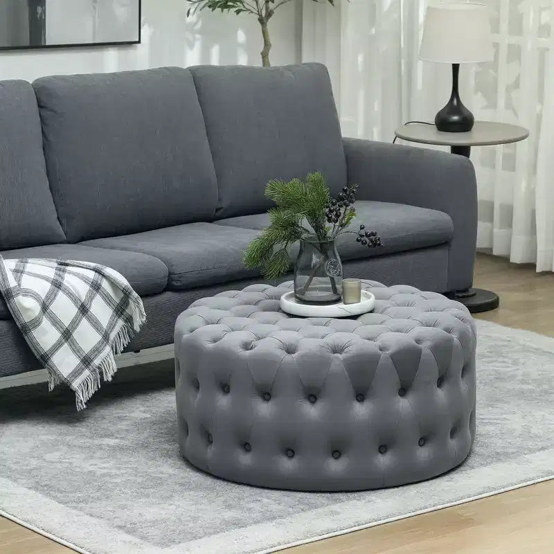 Tavolino rotondo ottomano con rivestimento effetto velluto, design capitonné e seduta imbottita