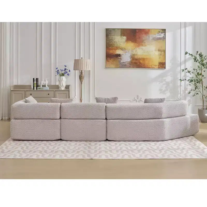 GDFStudio Arvik 140 Moderno Divano Sezionale a L a 4 Posti Rivestito in Bouclé con 4 Cuscini