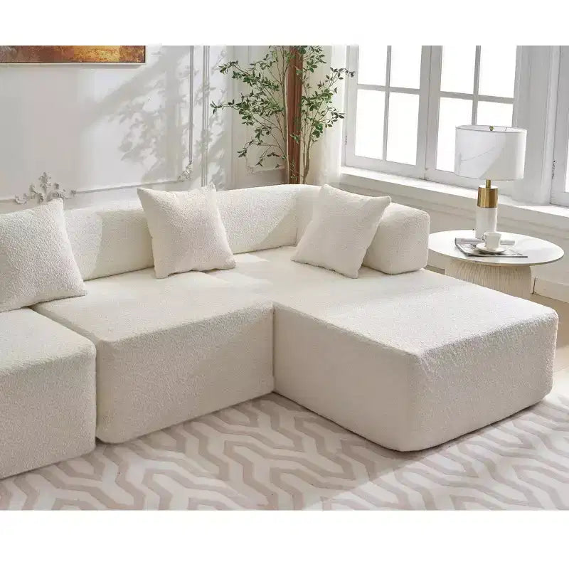 GDFStudio Arvik 140 Moderno Divano Sezionale a L a 4 Posti Rivestito in Bouclé con 4 Cuscini