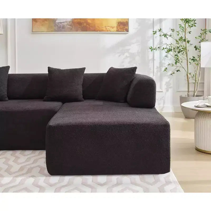 GDFStudio Arvik 140 Moderno Divano Sezionale a L a 4 Posti Rivestito in Bouclé con 4 Cuscini