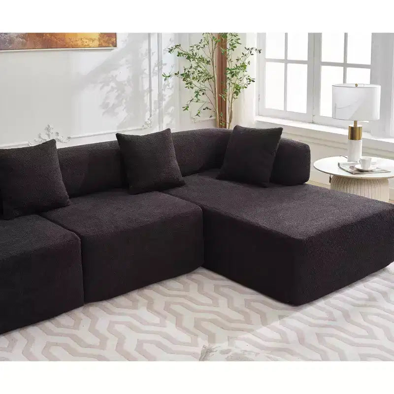 GDFStudio Arvik 140 Moderno Divano Sezionale a L a 4 Posti Rivestito in Bouclé con 4 Cuscini